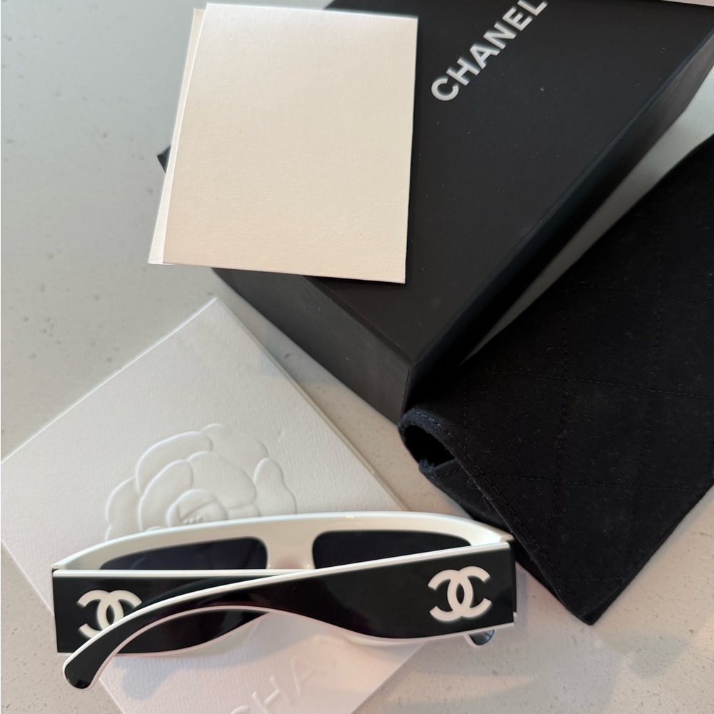 CHANEL Black and White Sunglasses with Iconic Logo